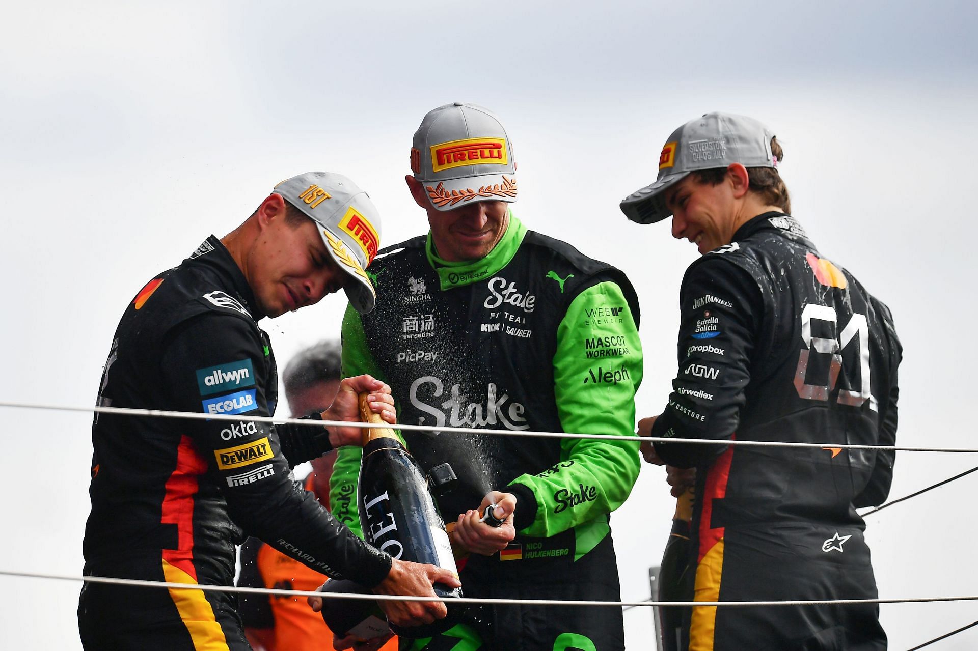 Lando Norris (L), Nico Hulkenberg, and Oscar Piastri (R) at the 2025 F1 Grand Prix of Great Britain - Source: Getty